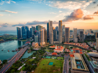 Aerial view of Singapore business district and city at twilight