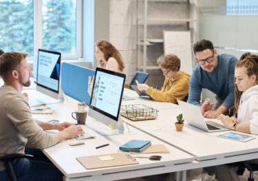People working in front of the computer