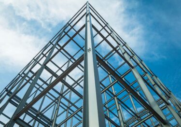 Construction of a building against the blue sky