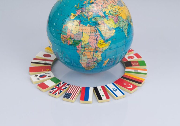 Different flags surrounding the globe