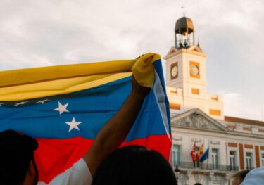 People holding Venezuela flag